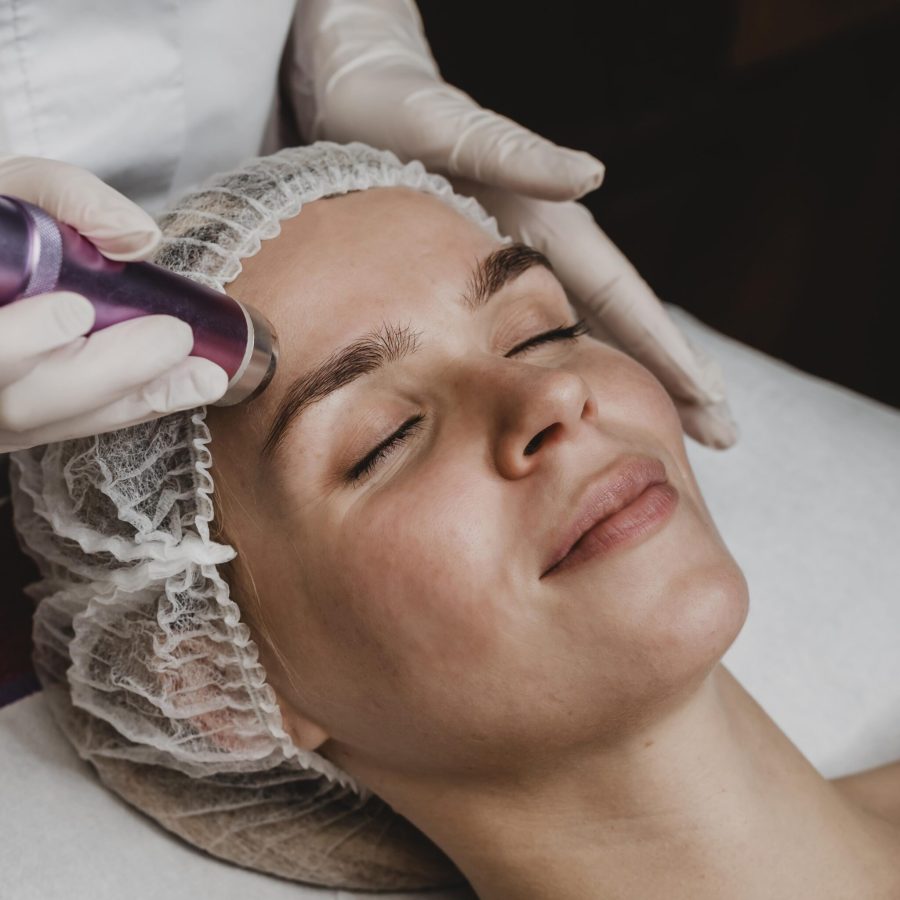 young-woman-having-cosmetic-treatment-spa